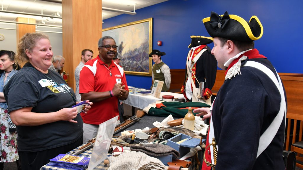 Delaware Military Museum’s Executive Director Joshua Loper presents artifacts related to the Revolutionary War.