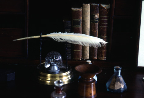 a photo of a desk with books