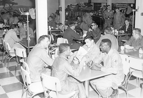 soldiers eating in mess hall