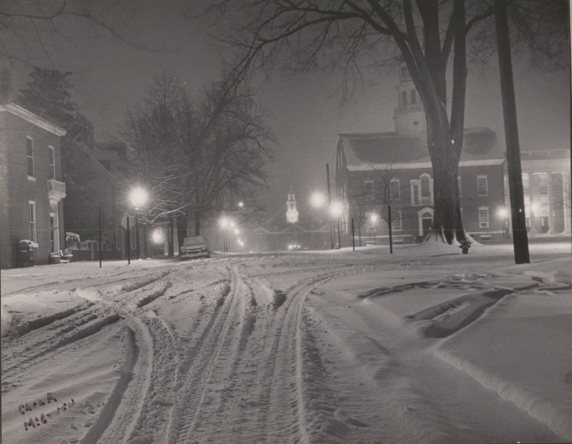 A snowy night on the Green in Dover, Delaware, with views of the Old State House, Legislative Hall, and the Kent County Courthouse.
