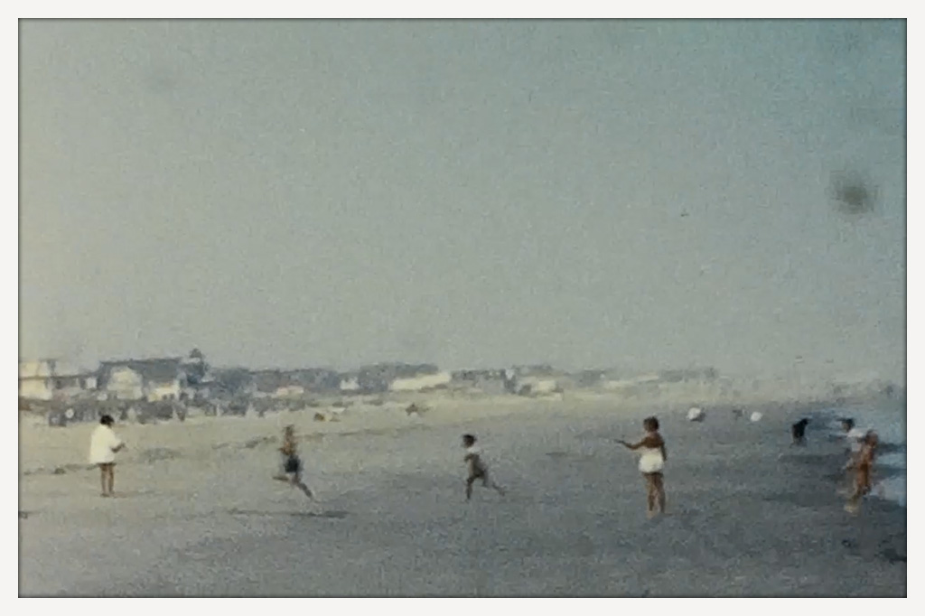 Still image from a video showing a beach, likely Rehoboth Beach.