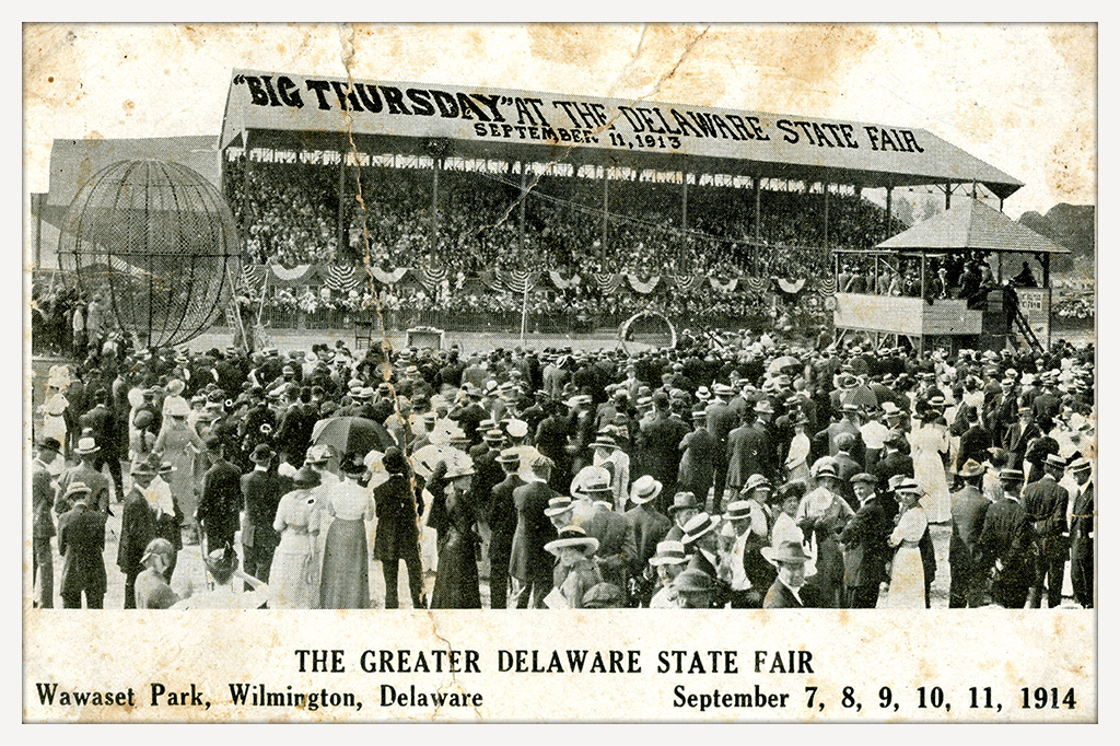 Crowd gathered in front of a packed grandstand at the Greater Delaware State Fair at Wawaset Park in Wilmington, September 1914.