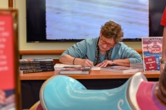 Author Robin Brown autographing copies of Treasured Traditions