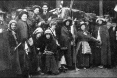 The hikers taking a break and talking to a few local residents earlier today at the Deer Park Hotel in Newark, Delaware. (February 20th, 1913)