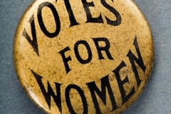 A Woman’s Suffrage pin.